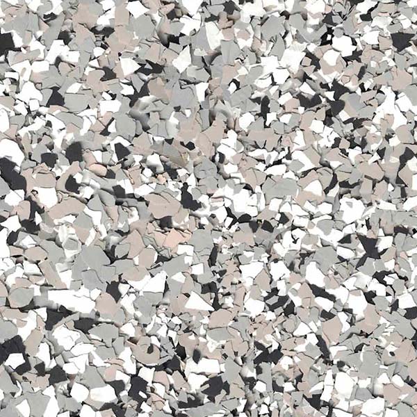 The image shows a multitude of irregularly shaped pieces in shades of gray, black, and white, resembling a terrazzo floor pattern or abstract mosaic.