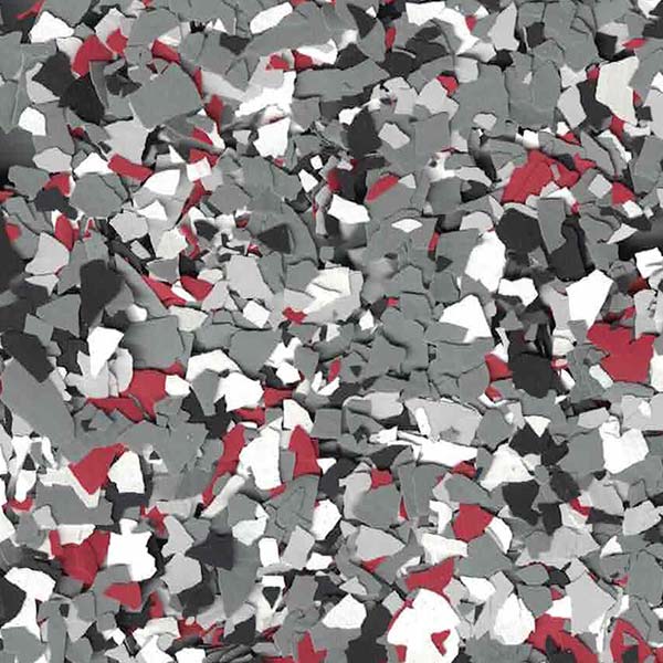 This image shows an abstract pattern of scattered, broken fragments in shades of gray, black, and white with sporadic red accents throughout.