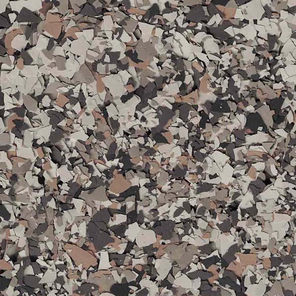 This image shows a speckled pattern of various-sized, irregularly shaped fragments in different shades of brown, black, gray, and white.