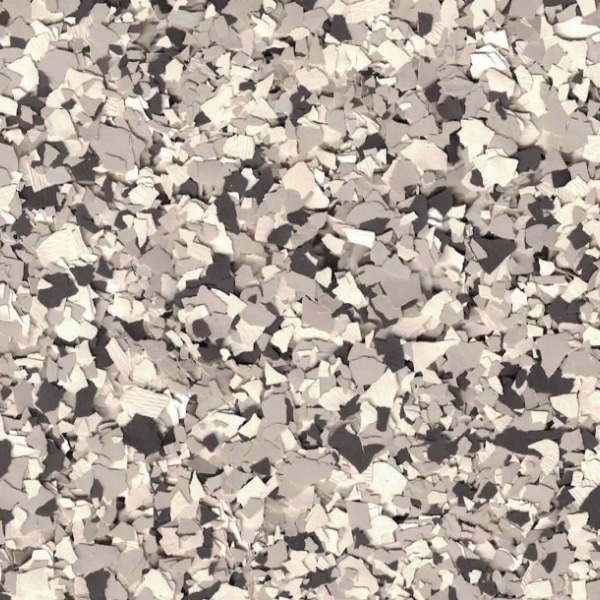 The image shows a dense, abstract pattern of broken or cracked pieces in different shades of beige and gray, resembling shattered stone or ceramic.