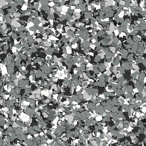 The image displays a chaotic pattern of fragmented shapes predominantly in shades of gray, resembling a digital or abstract camouflage texture.